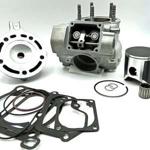 Assortment of engine parts including gaskets, a piston, and cylinder block on a white background.