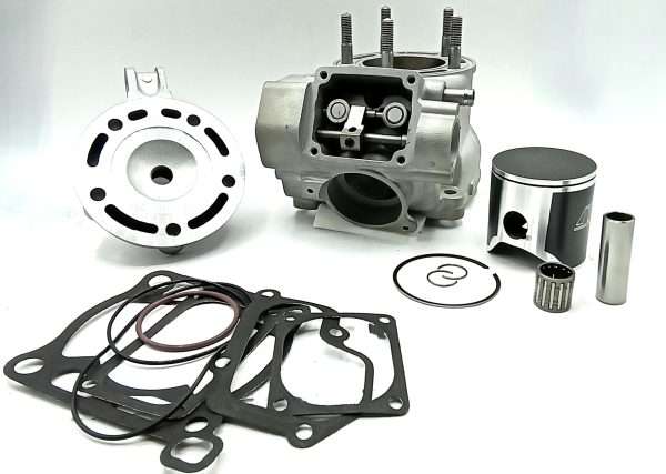 Assortment of engine parts including gaskets, a piston, and cylinder block on a white background.